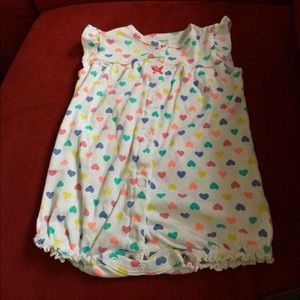 Caters rainbow onesie